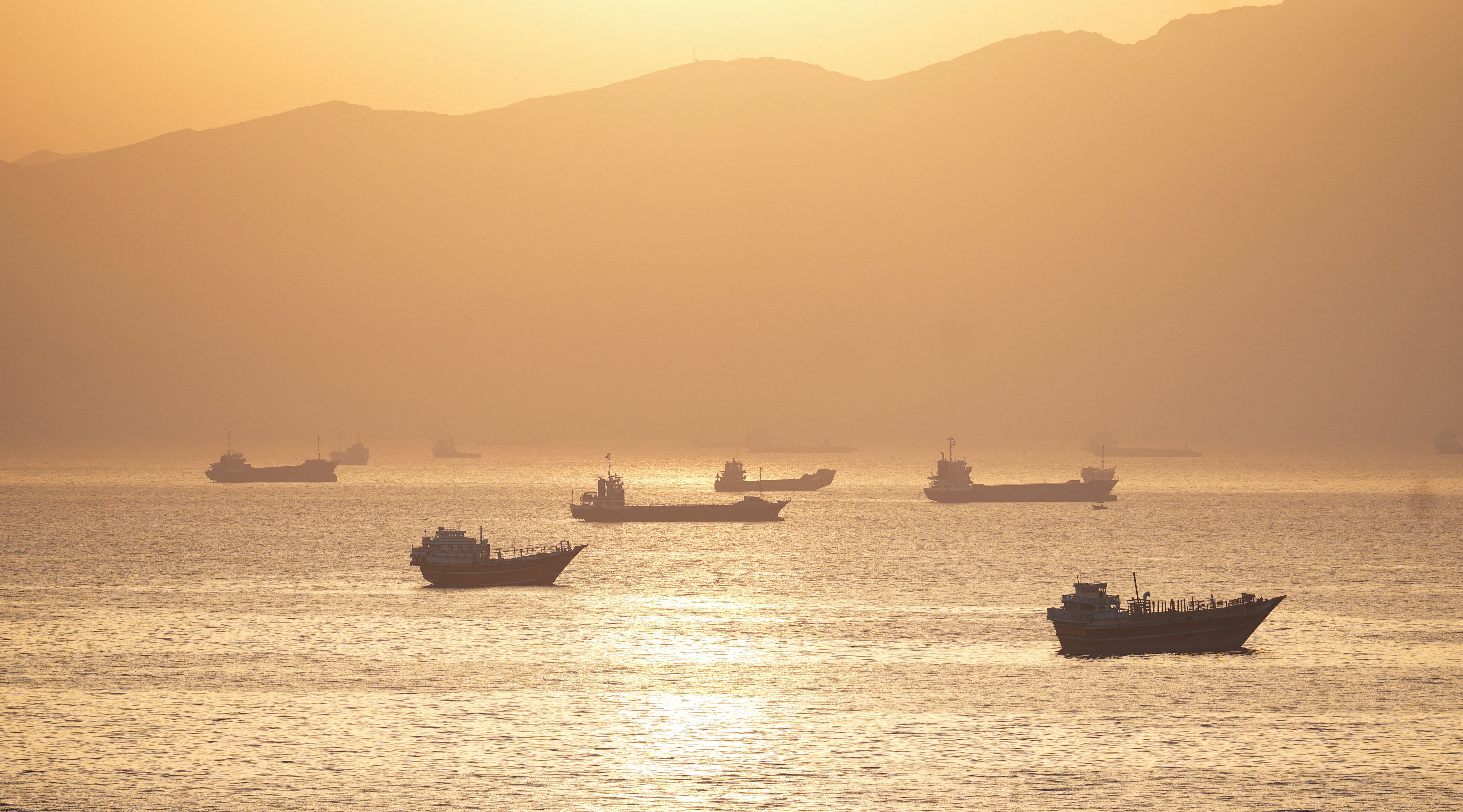 A view of ships near the Strait of Hormuz at sunset, file photo, undated