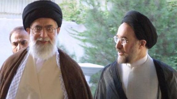 An undated photo showing Khamenei (L) with former president Khatami