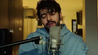 Iran protest anthem crooner takes heat for official license on debut album