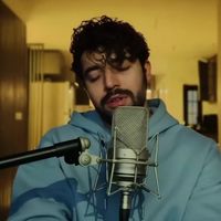 Iran protest anthem crooner takes heat for official license on debut album