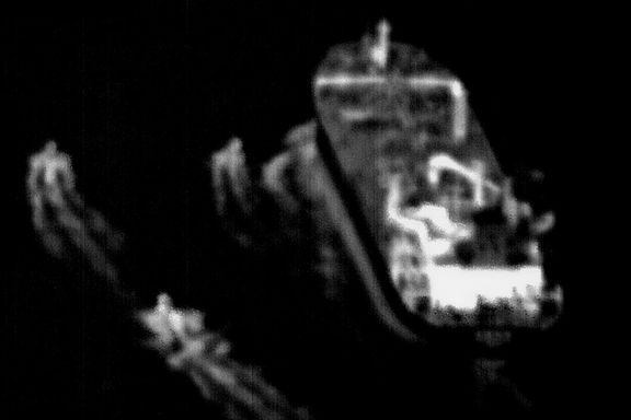 Photo issued by the US Navy showing Iranian fast-attack boats encircling the commercial ship on June 4, 2023