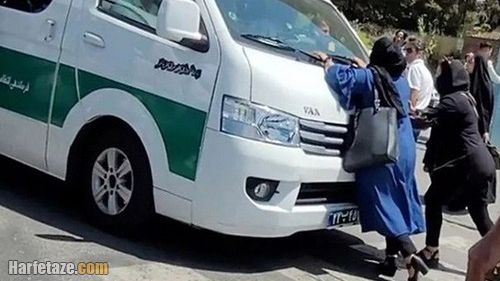 A mother in Tehran resisting the arrest of her daughter for hijab. July 2022
