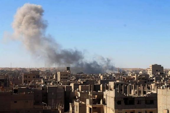 Smoke billows after a US strike in Al-Mayadin city in Syria’s Deir ez-Zor on August 25, 2022.