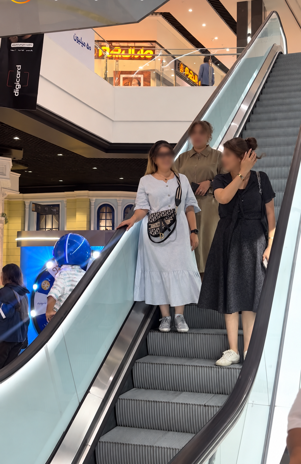 Women without mandatory hijab are seen at a shopping center in Iran. (undated)