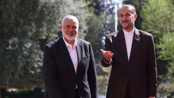 Iran's Foreign Minister Hossein Amir Abdollahian meets with Palestinian group Hamas' top leader, Ismail Haniyeh in Tehran, Iran, March 26, 2024