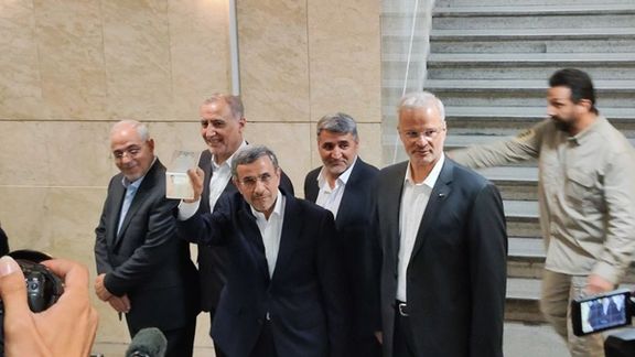 Ahmadinejad arriving accompanied by former aides to register candidacy. June 2, 2024