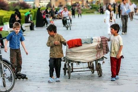 Afghan labor children in Iran, gathered around a cart filled with items, possibly for sale or collection