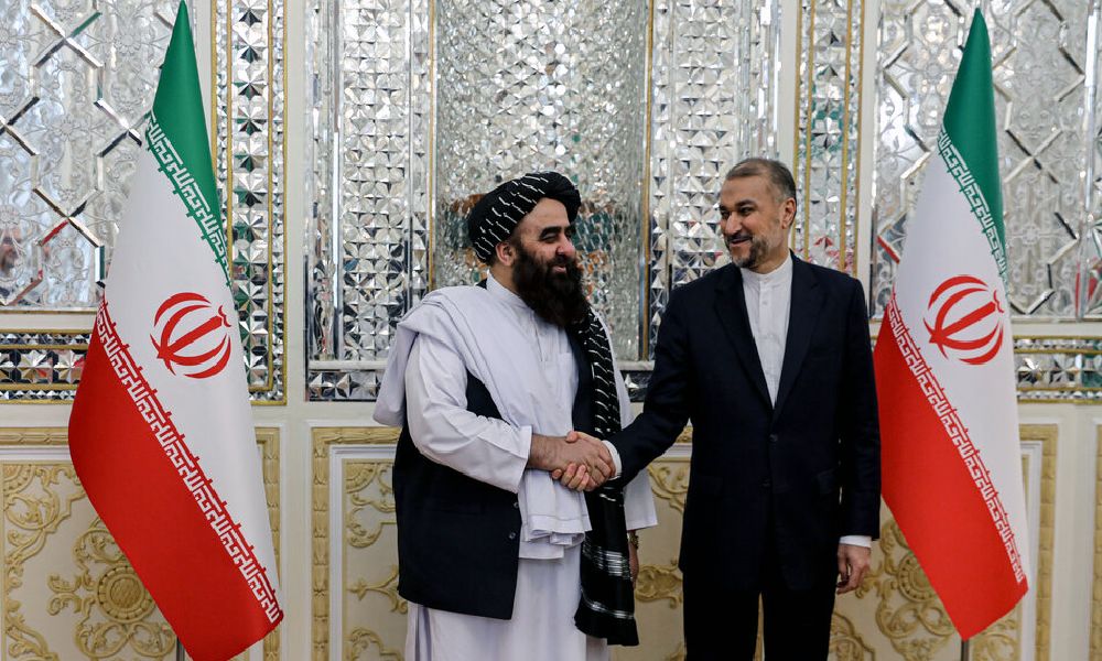 Taliban's Foreign Minister Amir Khan Muttaqi (left) and his Iranian counterpart Hossein Amir-Abdollahian in Tehran (December 2023) 