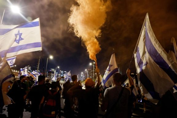 People demonstrate on the highway on the 'Day of National Resistance' in protest against Israeli Prime Minister Benjamin Netanyahu and his nationalist coalition government's judicial overhaul, in Tel Aviv, Israel July 18, 2023.