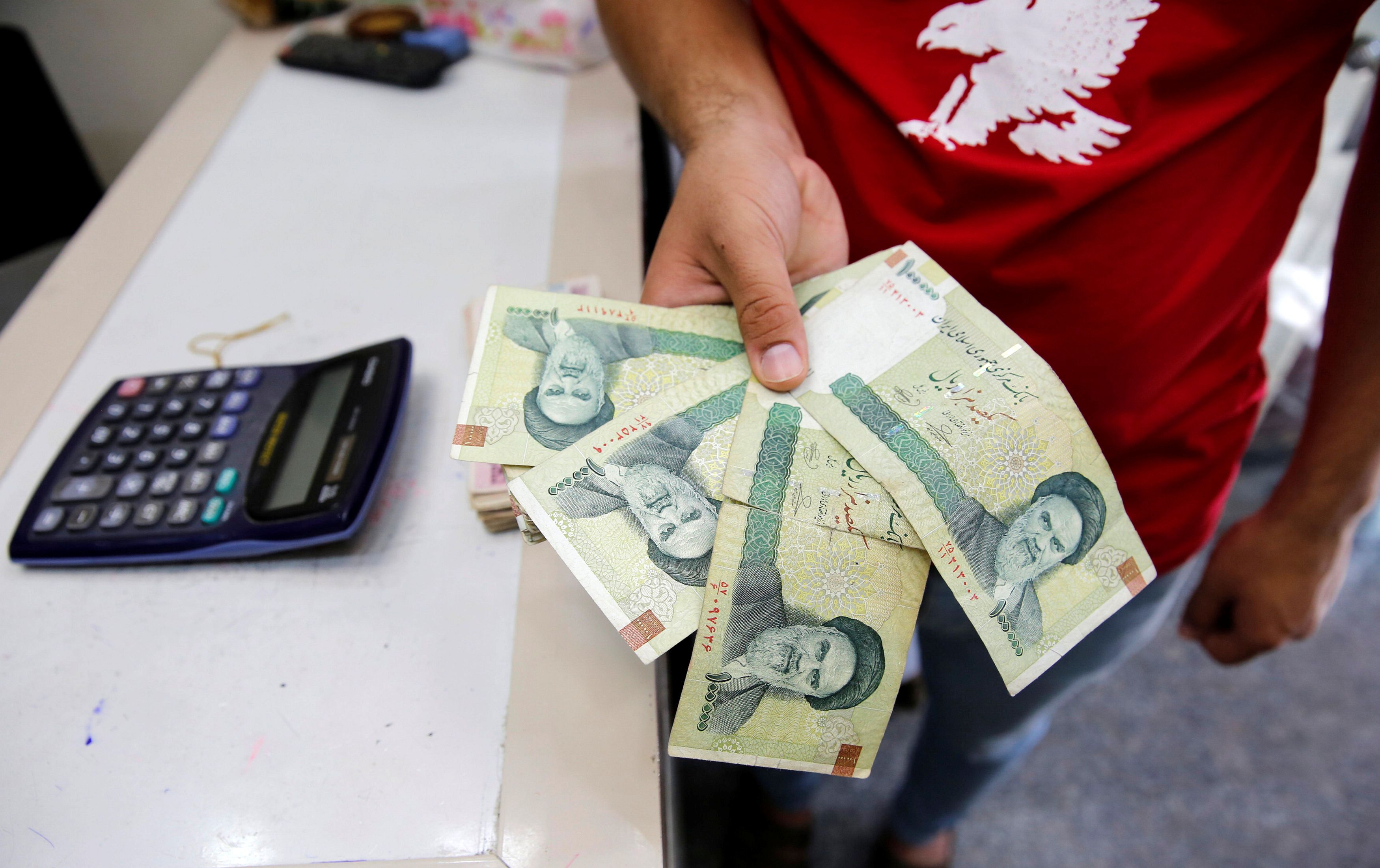Iran’s Central Bank to inject cash into market as rial hits record lows