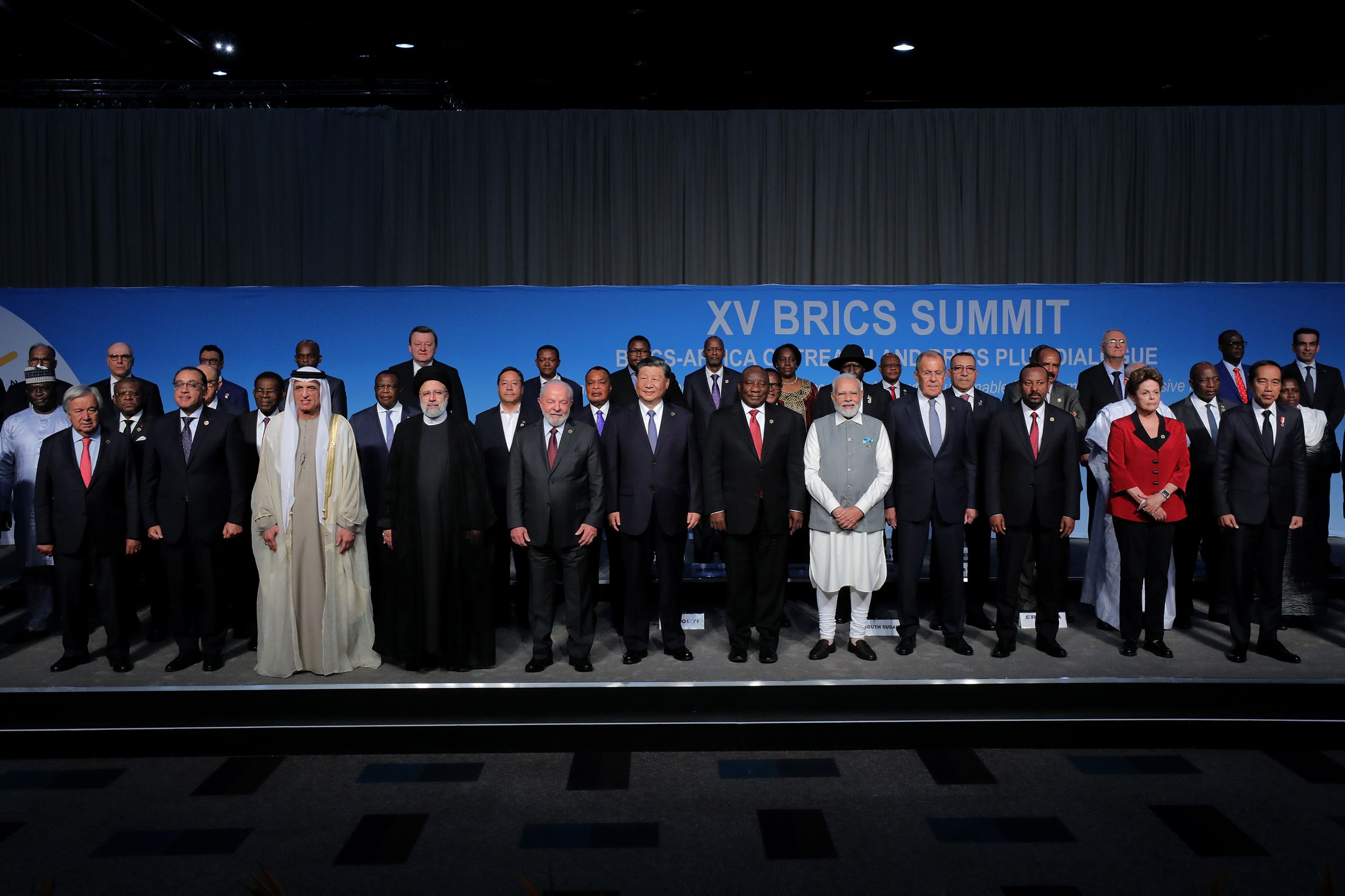 Participants of the BRICS summit pose for a group photo at the Sandton Convention Centre in Johannesburg on August 24, 2023 