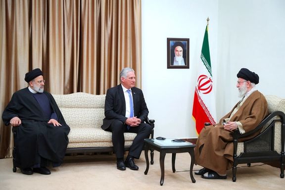Iran's Supreme Leader Ali Khamenei meets with Cuban President Miguel Diaz-Canel and Iranian President Ebrahim Raisi, in Tehran, December 4, 2023.