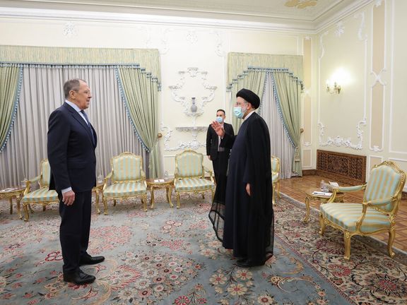 Iranian President Ebrahim Raisi (right) during a meeting with Russian Foreign Minister Sergey Lavrov in Tehran in June 2022