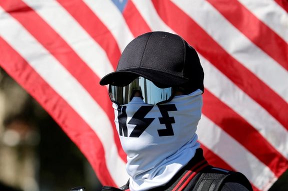 A member of the white nationalist group NatSoc Florida protests against U.S. support for Israel, in response to the war between Israel and Hamas, in Lady Lake, Florida, US, October 21, 2023.
