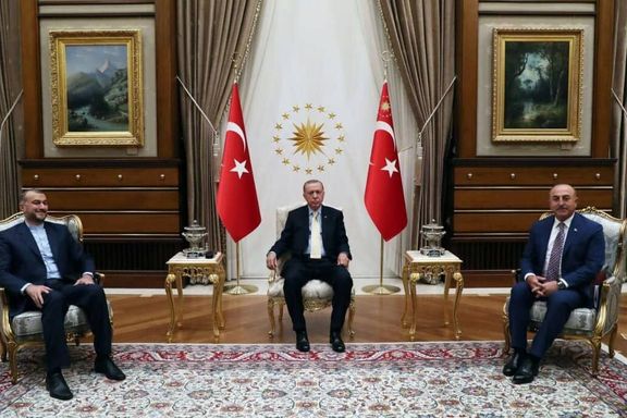 Iran’s Foreign Minister Hossein Amir-Abdollahian (left), Turkish President Recep Tayyip Erdoğan (center) and Turkish Foreign Minister Mevlüt Çavuşoğlu in Ankara on June 27, 2022
