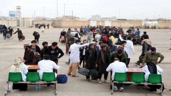 Afghan refugees at a border crossing waiting to enter Iran. 2021