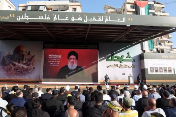 Lebanon's Hezbollah leader Sayyed Hassan Nasrallah appears on a screen as he addresses his supporters during a ceremony to honour fighters killed in the recent escalation with Israel, in Beirut's southern suburbs, Lebanon November 3, 2023.