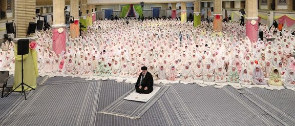 Iran’s ruler Ali Khamenei during a meeting with a group of schoolgirls (February 2023)