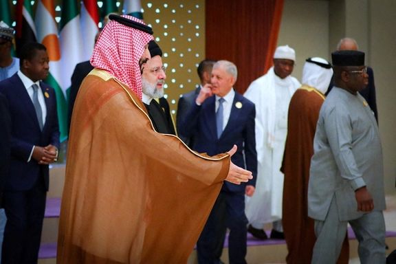Saudi Crown Prince Mohammed bin Salman welcomes Iranian President Ebrahim Raisi during the Organisation of Islamic Cooperation (OIC) summit in Riyadh, Saudi Arabia, November 11, 2023.