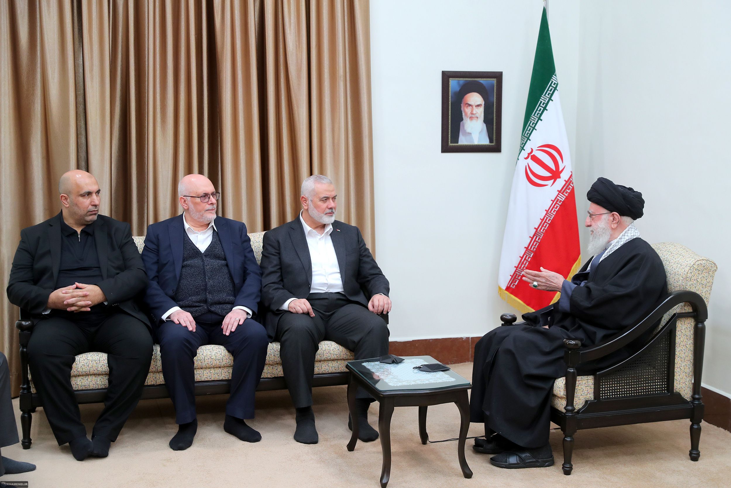 Hamas leader Ismail Haniyeh (3rd left) and Iran’s ruler Ali Khamenei (right) during a meeting in Tehran on March 26, 2024 