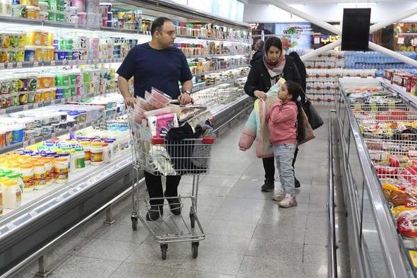 For many Iranians, paychecks now barely cover food