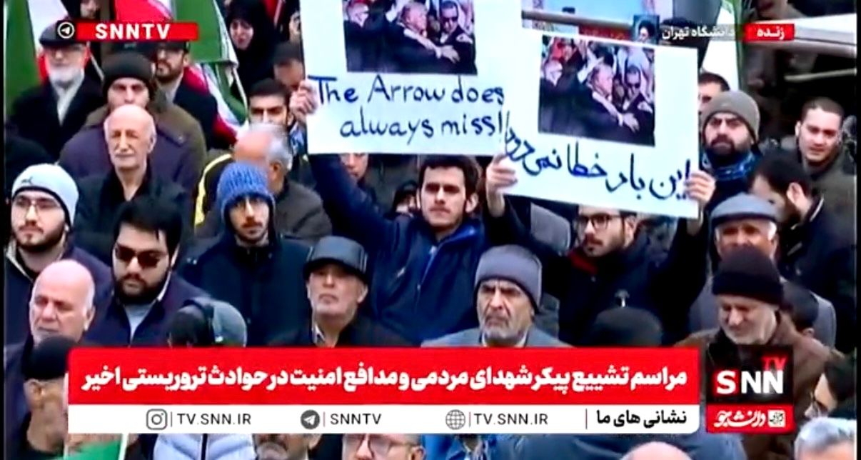 Placard at Iranian state event threatens Trump