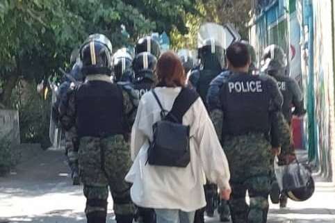 File photo of a woman defying mandatory hijab