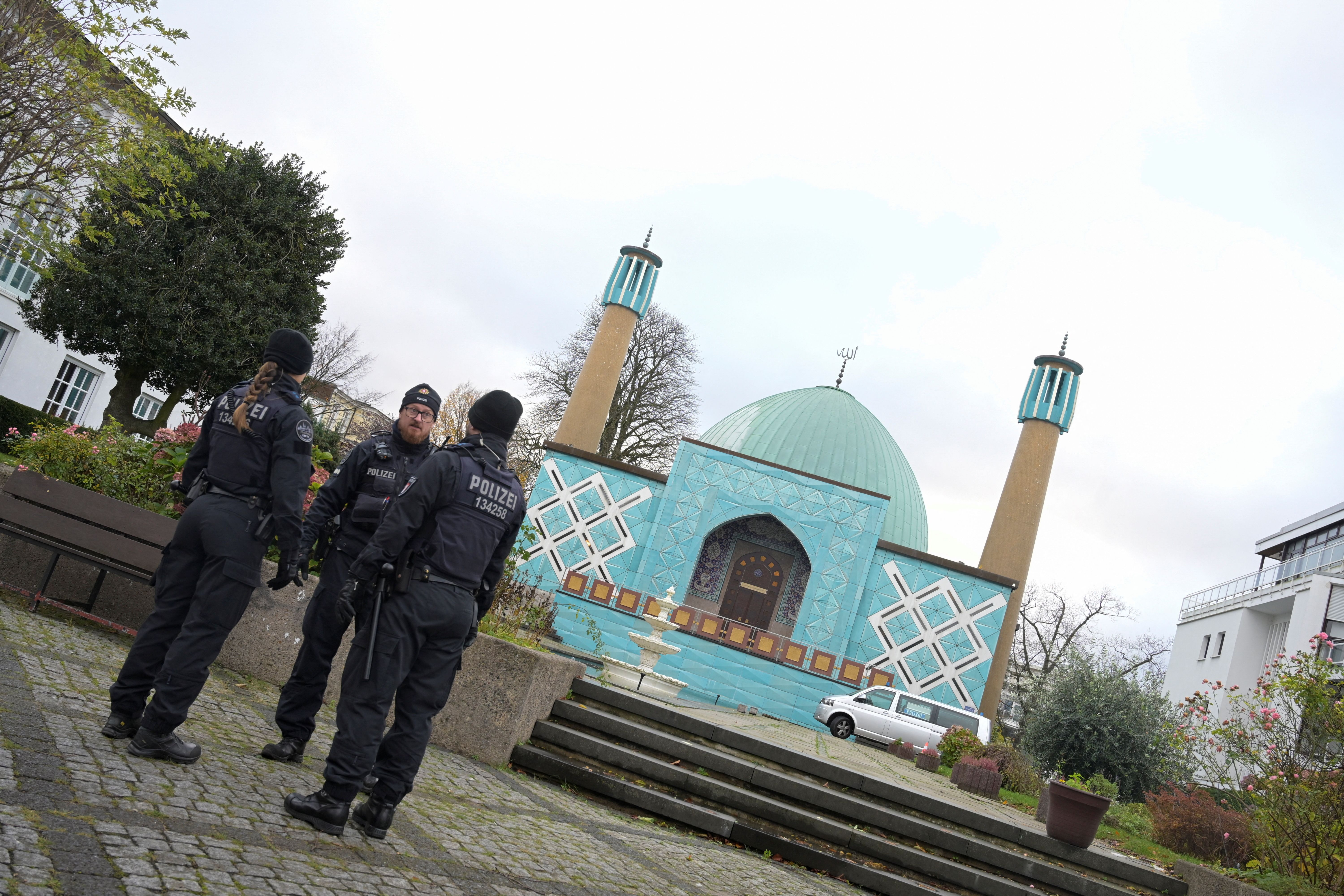 German police stand outside during an Islamic Center Hamburg raid, due to suspicion of members acting against a constitutional order and supporting the militant group Hezbollah in Hamburg, Germany, November 16, 2023. 
