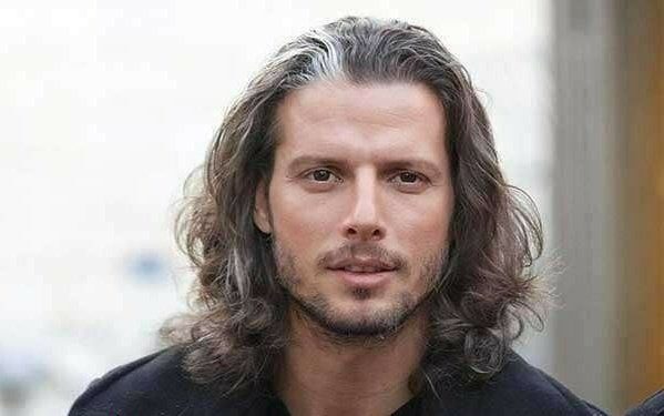 Tehran Police Warn Long-Haired Male Football Coach Over His Hijab 