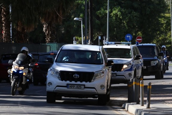 Police vehicles arrive at a court, where a remand order was issued against a man suspected of plotting to murder Israeli businesspeople on the island, in Nicosia, Cyprus October 6, 2021.