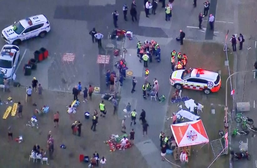 An aerial view of emergency personnel working at the scene of a shooting incident at Bondi Beach in Sydney, Australia, December 14, 2025, in this screen grab from a video. (credit: NINE NETWORK/SEVEN NETWORK/AUSTRALIAN BROADCASTING CORPORATION/Handout via REUTERS)