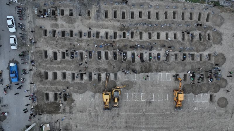 Graves are being prepared for the victims following a reported strike on a school in Minab, Iran, March 2, 2026.