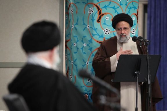 Iranian President Ebrahim Raisi during a meeting with Supreme Leader Ali Khamenei