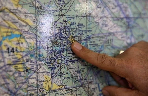  Gen. Masoud Rouzkhosh pointing at Shekari Air Base's location on the map (undated)