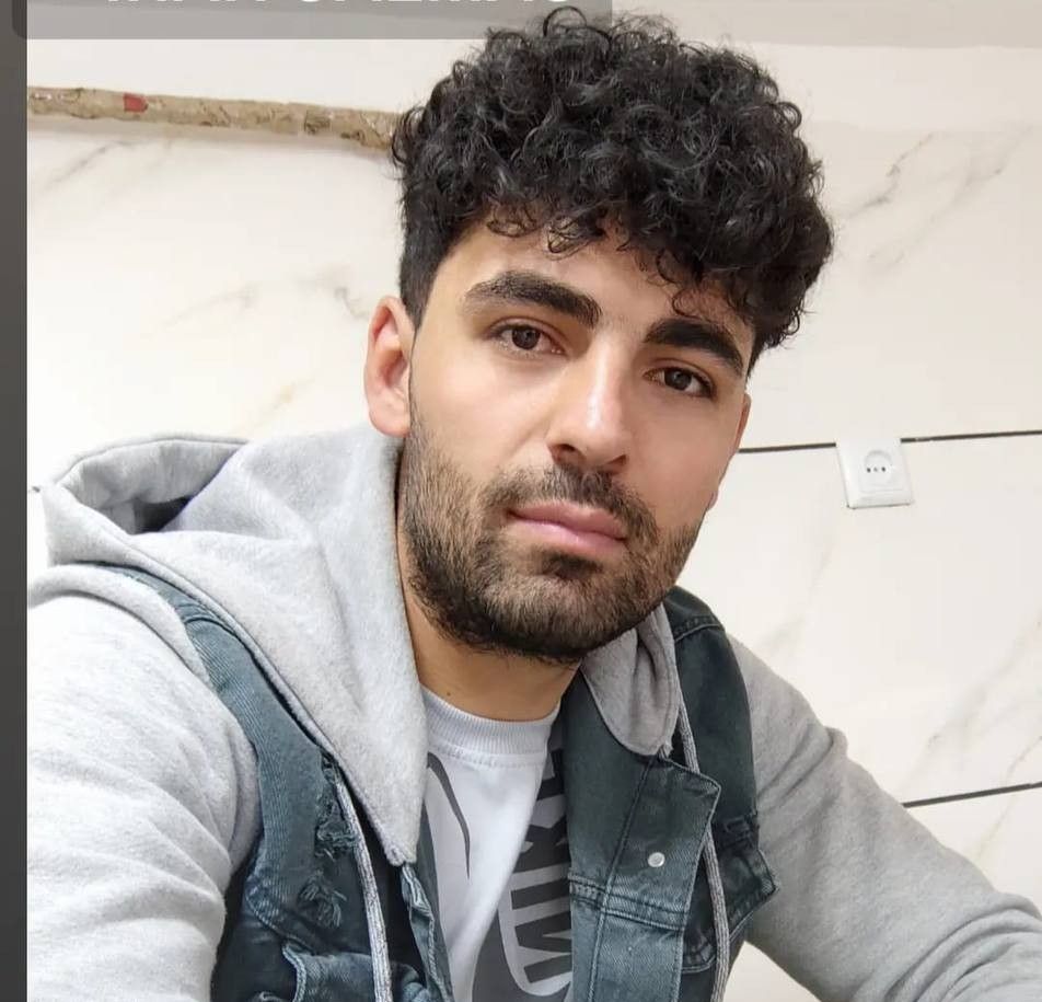 میلاد اطمانی، مجروحی که پس از بازداشت، با شلیک تیر خلاص به قتل رسید