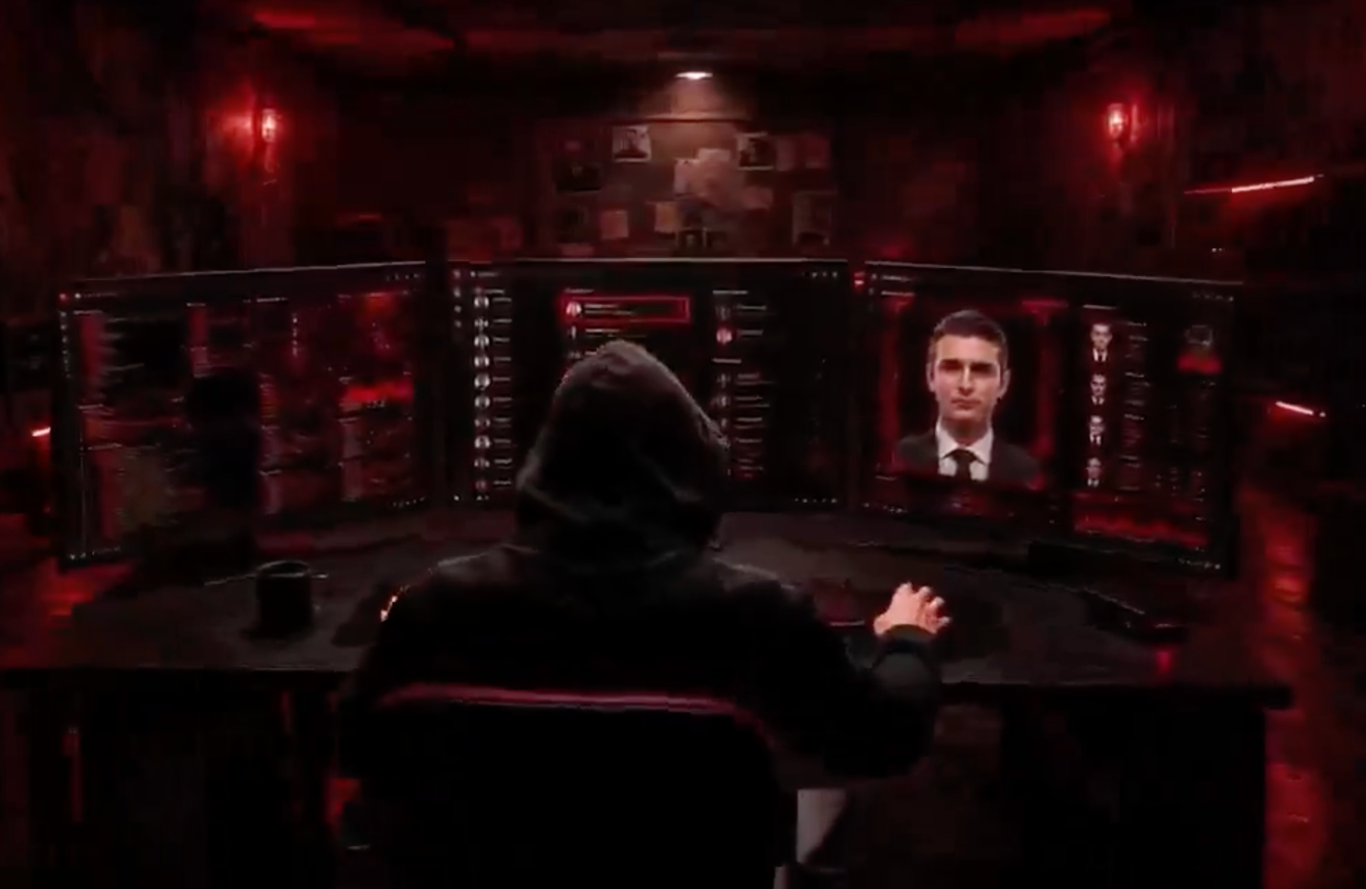 A screen grab from an Iranian state television segment depicting a hooded figure monitoring images of Barron Trump as part of a report on purported efforts to reach the US president’s son