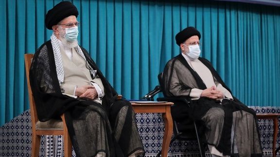 Iran's Supreme Leader Ali Khamenei and President Ebrahim Raisi (R). August 3, 2021