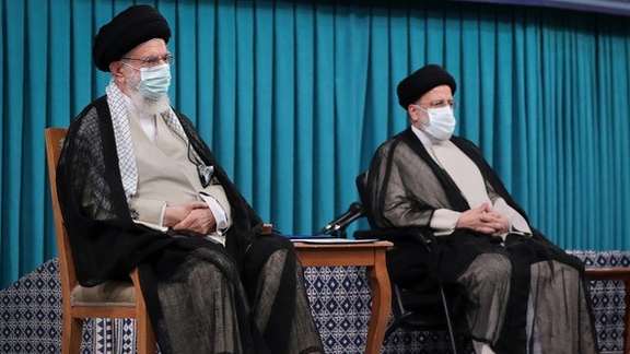 Supreme Leader Ali Kahmenei and Ebrahim Raisi during his inauguration in August 2021.