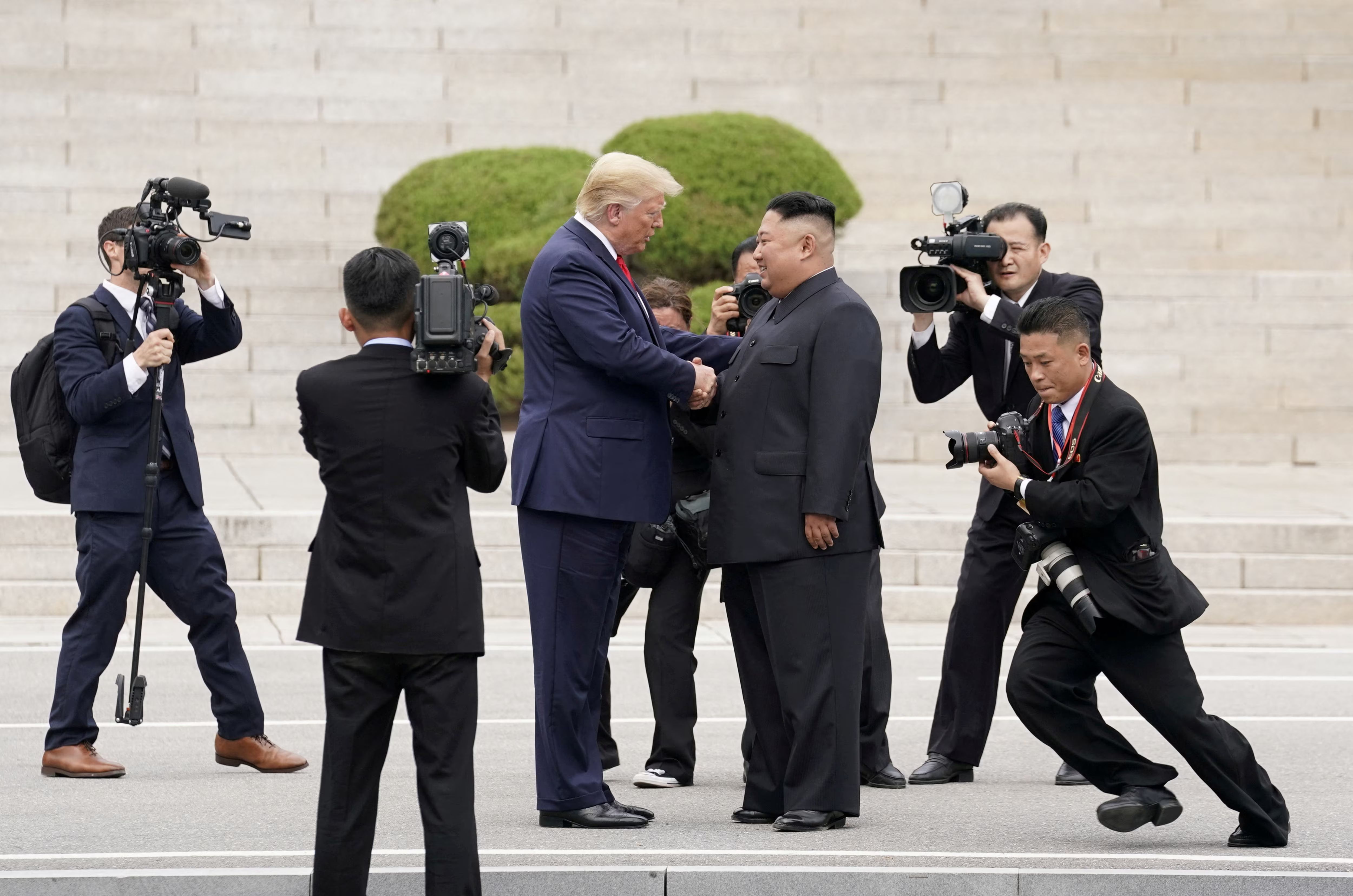 US President Donald Trump meets with North Korean leader Kim Jong Un at the demilitarized zone separating the two Koreas, in Panmunjom, South Korea, June 30, 2019. 