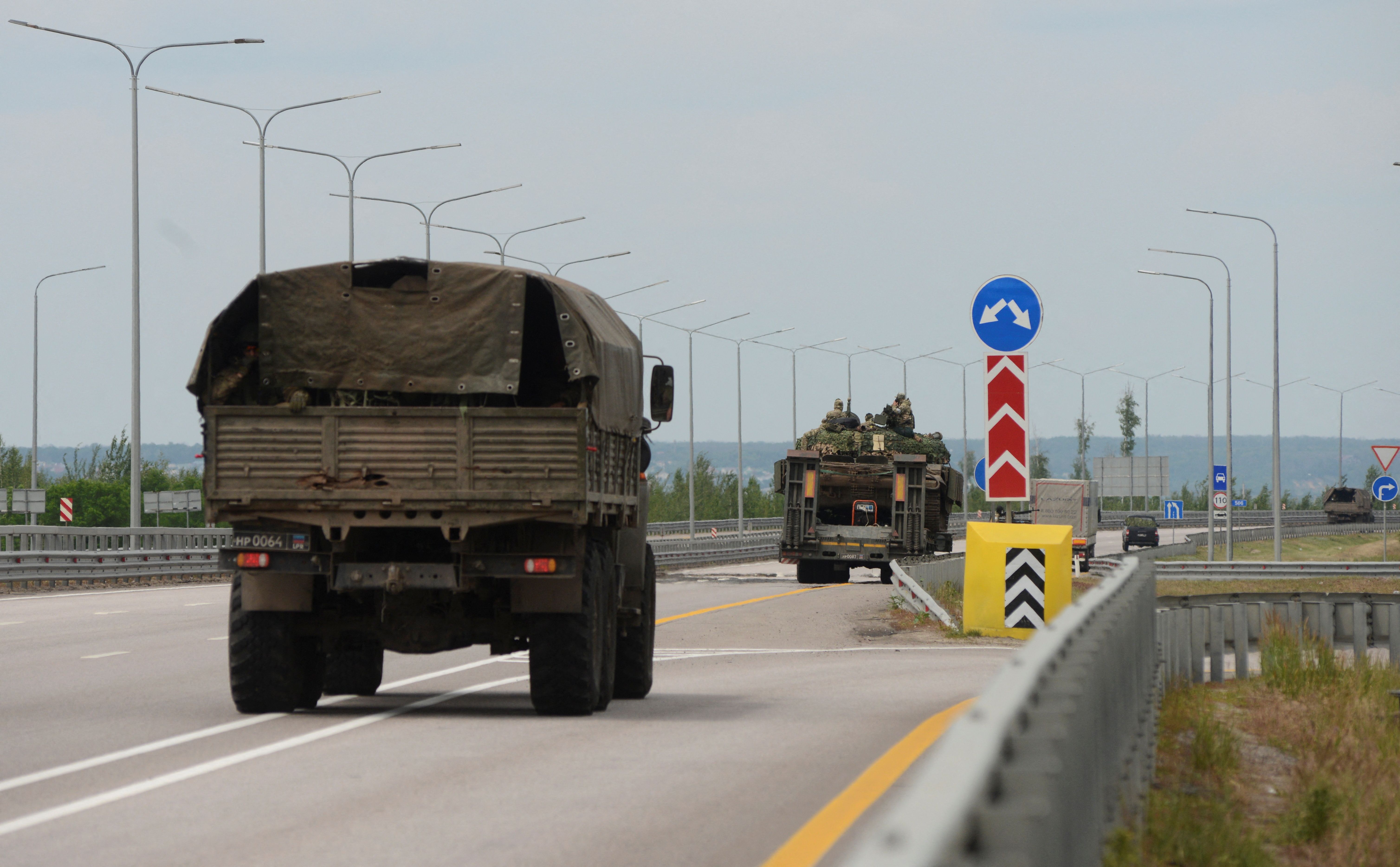 A military column of Wagner private mercenary group drives along M-4 highway, which links the capital Moscow with Russia's southern cities, near Voronezh, June 24, 2023