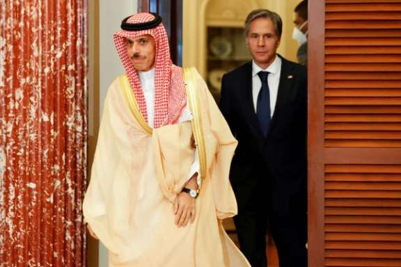 US Secretary of State Antony Blinken and Saudi Arabia's Foreign Minister Faisal bin Farhan Al-Saud arrive to deliver remarks at the State Department in Washington, October 14, 2021.