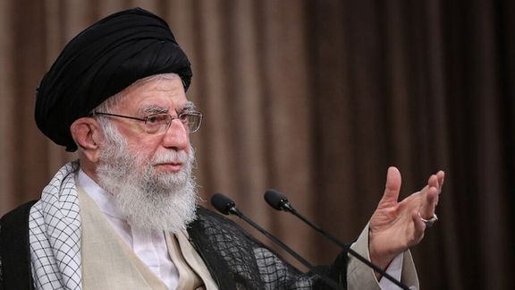 Ali Khamenei, with a high turban.
