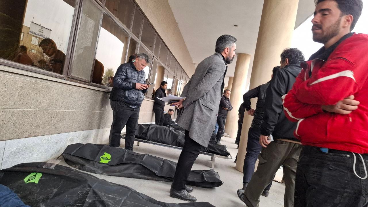 People gather at the Kahrizak facility south of Tehran to collect the bodies of loved ones killed during the protests. (January 2026)
