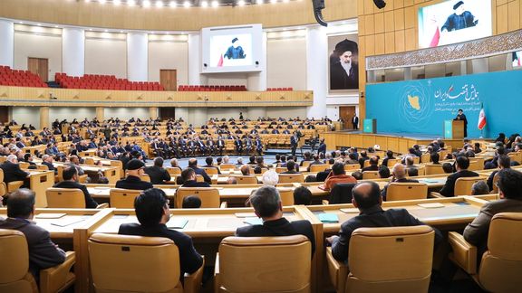 Participants listening to President Ebrahim Raisi’s speech at the Iranian Economy Conference in Tehran (December 2023)