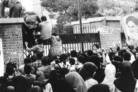 A crowd of young people at the gates of the US embassy in Tehran in November 1979 as they were entering the compound.
