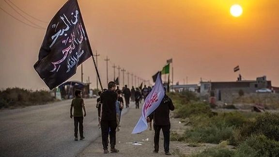 A group of Iranian pilgrims of Arbaeen on their way to the Iraqi city of Karbala