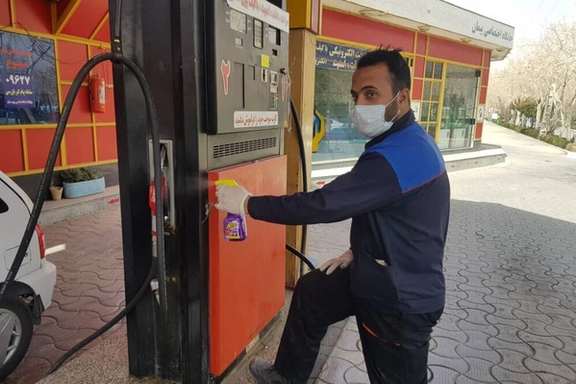 A gas station attendant in Tehran