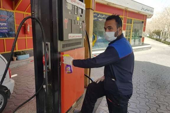 A gas station attendant in Tehran seen in October 2021