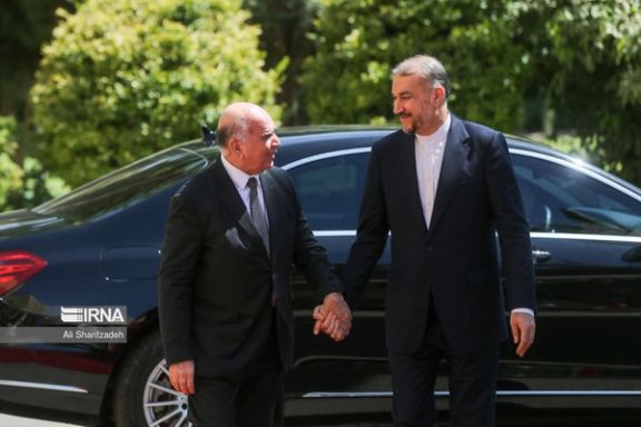Iraqi Foreign Minister Fuad Hussein (left) and his Iranian counterpart Hossein Amir-Abdollahian in Tehran on September 13, 2023