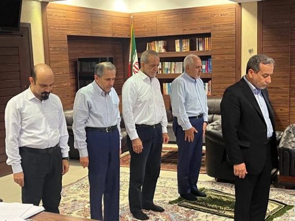 Abbas Araghchi leads prayers, with former FM Mohammad Javad Zarif and President Masoud Pezeshkian in the back, June 8, 2024.